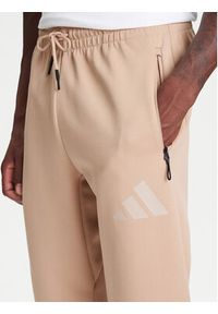 Adidas - adidas Spodnie dresowe Z.N.E. JW4725 Beżowy Loose Fit. Kolor: beżowy. Materiał: bawełna #3