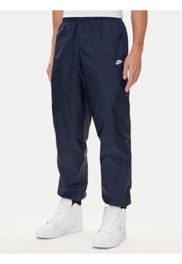Nike Dres Club HJ1985 Granatowy Relaxed Fit. Kolor: niebieski. Materiał: syntetyk