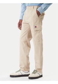 Tommy Jeans Spodnie materiałowe Sonny DM0DM22651 Beżowy Slim Fit. Kolor: beżowy. Materiał: bawełna #1