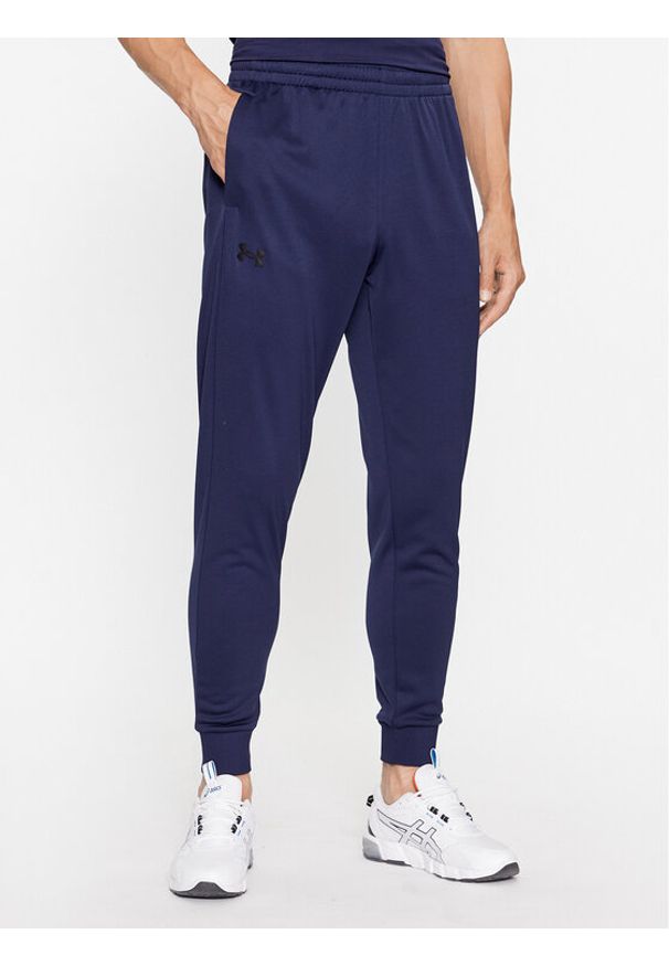 Under Armour Spodnie dresowe Ua Armour Fleece Joggers 1373362 Granatowy Loose Fit. Kolor: niebieski. Materiał: syntetyk