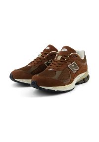 Sneakersy unisex New Balance M2002RFF. Kolor: brązowy. Materiał: guma, skóra. Szerokość cholewki: normalna #4