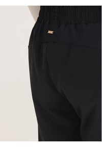Athlecia Spodnie dresowe Timmie W Pants EA221212 Czarny Regular Fit. Kolor: czarny. Materiał: syntetyk #2
