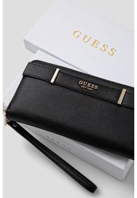 Guess - GUESS Czarny damski portfel Anadela Slg. Kolor: czarny. Materiał: skóra ekologiczna