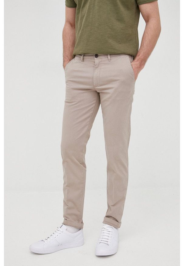 Drykorn spodnie Mad męskie kolor beżowy w fasonie chinos. Kolor: beżowy. Materiał: tkanina, materiał. Wzór: gładki