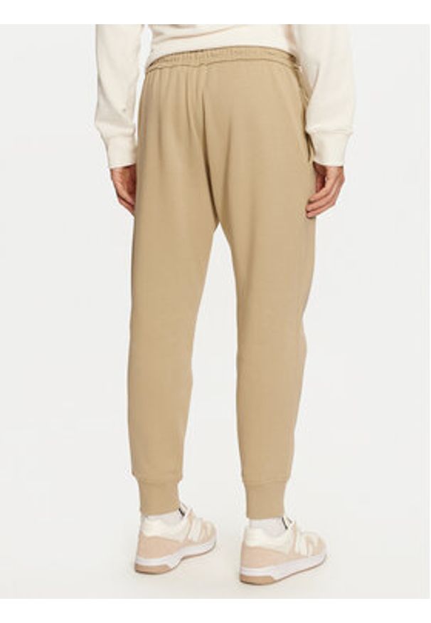 Timberland Spodnie dresowe TB0A5YFBDH41 Beżowy Regular Fit. Kolor: beżowy. Materiał: bawełna