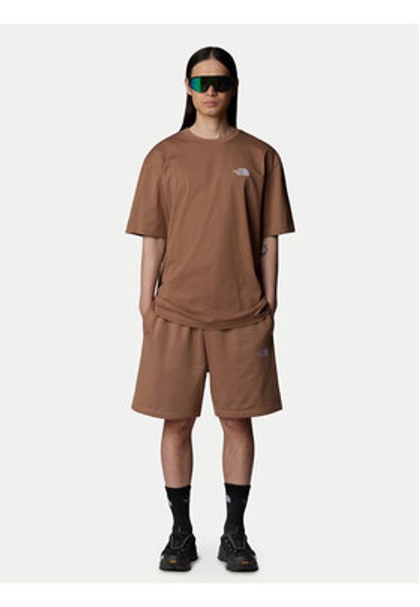 The North Face Szorty sportowe Essential NF0A8C2G Brązowy Loose Fit. Kolor: brązowy. Materiał: bawełna. Styl: sportowy