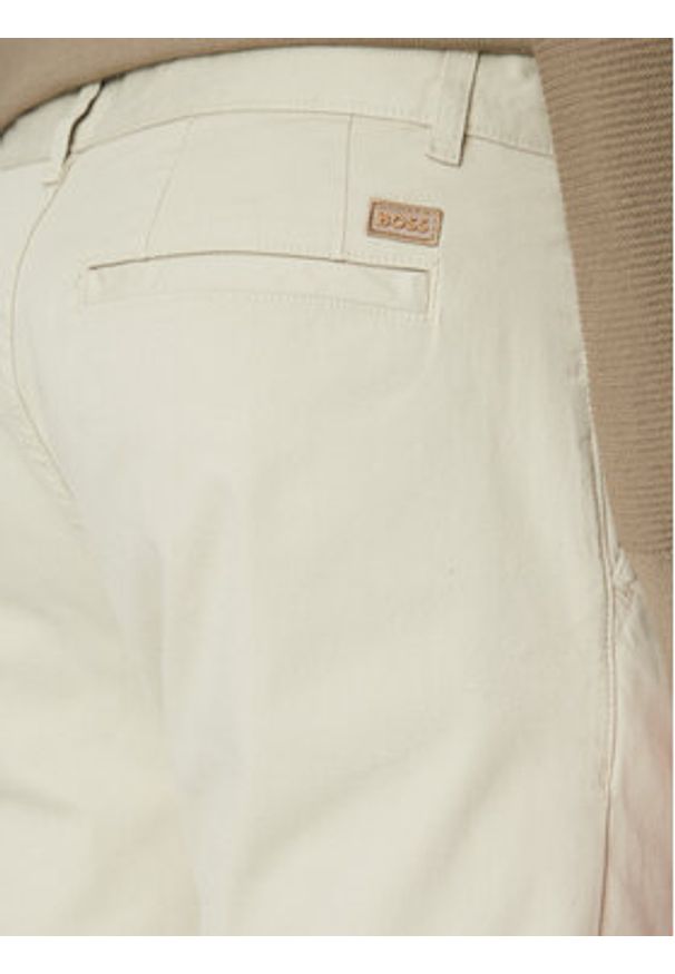 BOSS Chinosy 50529308 Beżowy Relaxed Fit. Kolor: beżowy. Materiał: bawełna