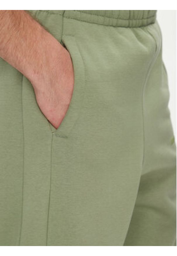 Karl Kani Spodnie dresowe Ellipse Straight Leg 60060043 Khaki Relaxed Fit. Kolor: brązowy. Materiał: syntetyk