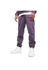 Spodnie dresowe Urban Classics Ultra Heavy. Kolor: fioletowy. Materiał: dresówka. Sport: bieganie #1