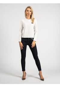 TOMMY HILFIGER - Tommy Hilfiger Bluzka | DW0DW07433 | Kobieta | Biały. Okazja: na co dzień. Kolor: biały. Materiał: bawełna, poliester. Długość rękawa: długi rękaw. Długość: długie. Wzór: aplikacja. Styl: casual #1