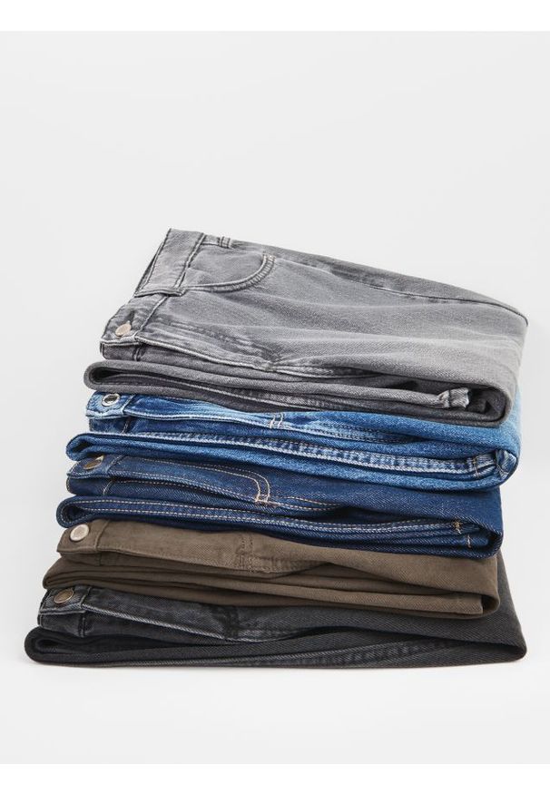 Reserved - Jeansy wide leg - granatowy. Kolor: niebieski