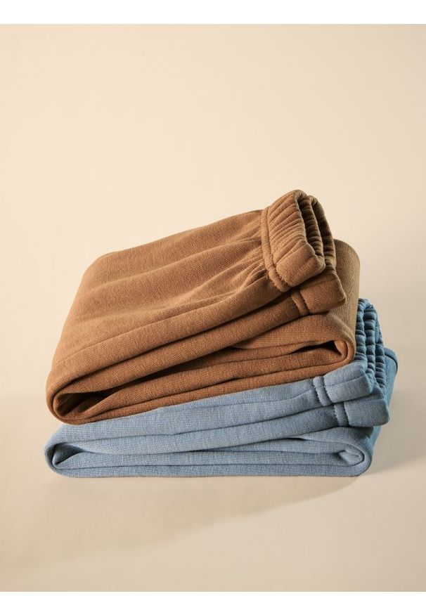 Reserved - Spodnie z ociepleniem - brązowy. Kolor: brązowy. Materiał: bawełna, dzianina