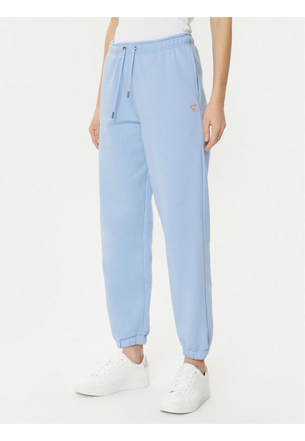 Guess Jeans Spodnie dresowe W4YB33 KC811 Niebieski Regular Fit. Kolor: niebieski. Materiał: syntetyk