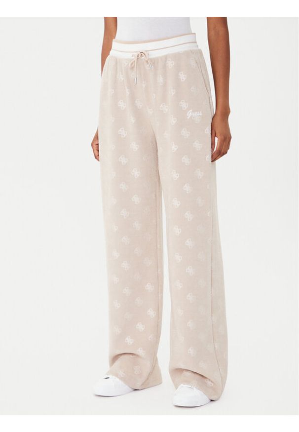 Guess Spodnie dresowe V5BB00 K1902 Brązowy Wide Leg. Kolor: brązowy. Materiał: syntetyk