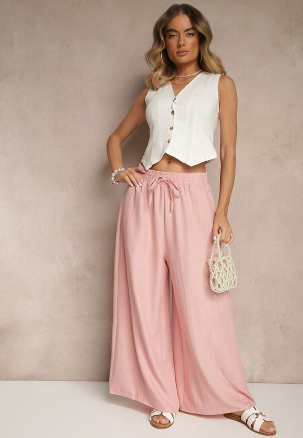 Renee - Różowe Szerokie Spodnie High Waist Ozdobione Wiązaniem Telonia. Okazja: na co dzień. Stan: podwyższony. Kolor: różowy. Wzór: aplikacja. Styl: casual, elegancki