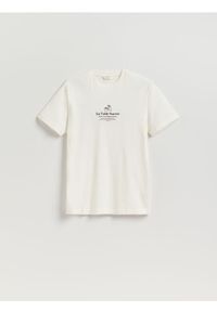 Reserved - T-shirt comfort z nadrukiem - złamana biel. Materiał: bawełna, dzianina. Wzór: nadruk