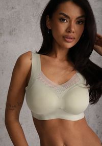 Renee - Zielony Sportowy Biustonosz z Usztywnieniem Ozdobiony Siateczkową Wstawką Edalissa. Kolor: zielony. Rodzaj stanika: wyciągane miseczki. Wzór: aplikacja #1