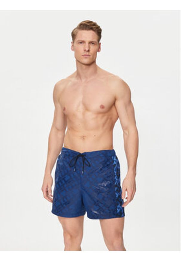 TOMMY HILFIGER - Tommy Hilfiger Szorty kąpielowe UM0UM03211 Granatowy Slim Fit. Kolor: niebieski. Materiał: syntetyk