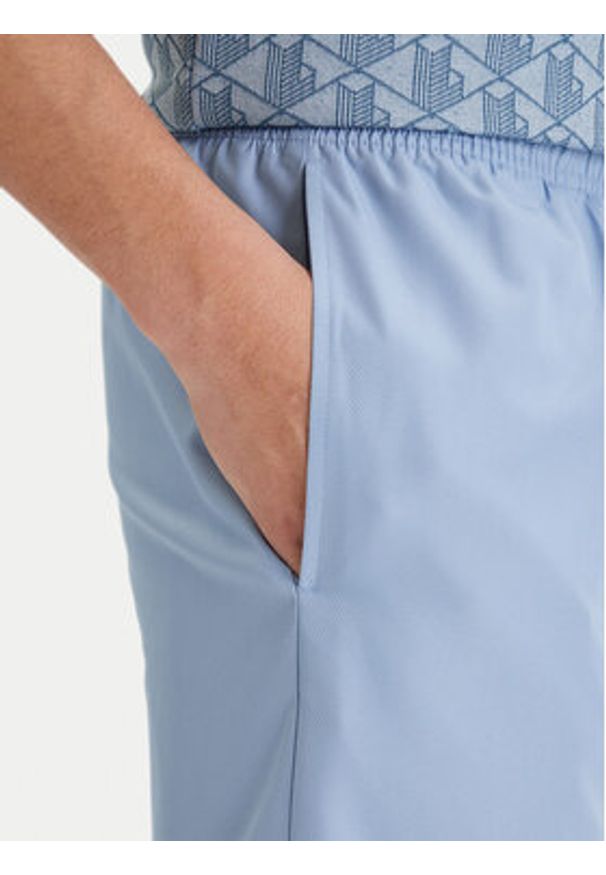 Lacoste Szorty sportowe GH353T Błękitny Relaxed Fit. Kolor: niebieski. Materiał: syntetyk. Styl: sportowy