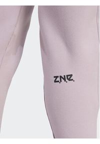 Adidas - adidas Spodnie dresowe Z.N.E. Winterized IS4334 Fioletowy Regular Fit. Kolor: fioletowy. Materiał: syntetyk