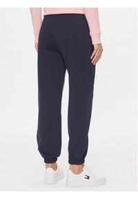Tommy Jeans Spodnie dresowe DW0DW16379 Granatowy Relaxed Fit. Kolor: niebieski. Materiał: bawełna