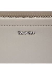 Calvin Klein Torebka Ck Must Convertible Camera Bag K60K612280 Beżowy. Kolor: beżowy. Materiał: skórzane