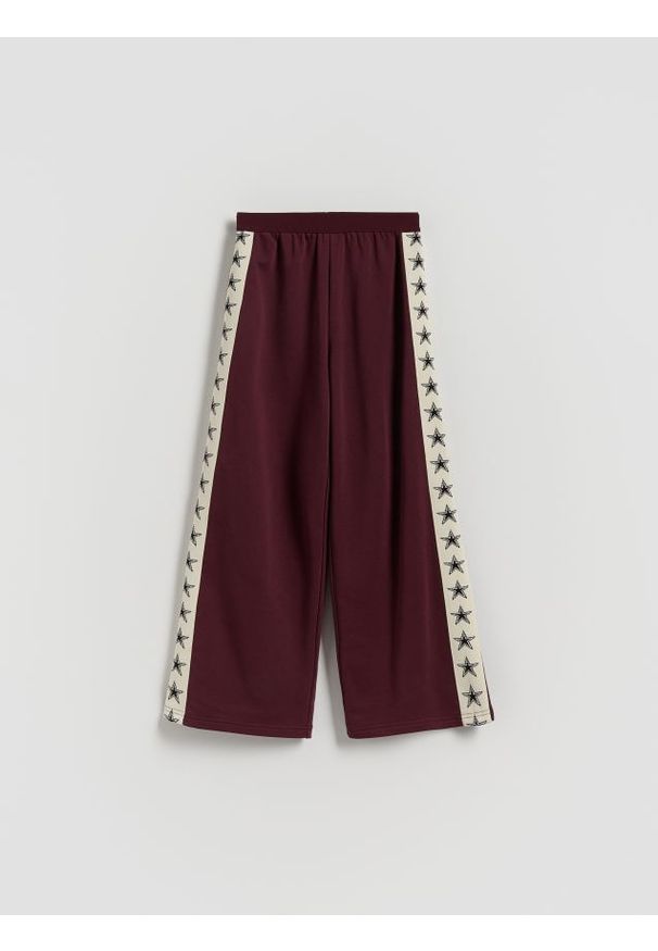 Reserved - Szerokie spodnie z lampasem - bordowy. Kolor: czerwony. Materiał: dzianina, bawełna