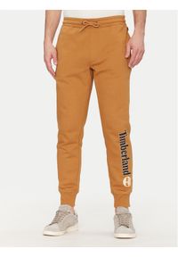 Timberland Spodnie dresowe TB0A5YFB Beżowy Regular Fit. Kolor: beżowy. Materiał: bawełna