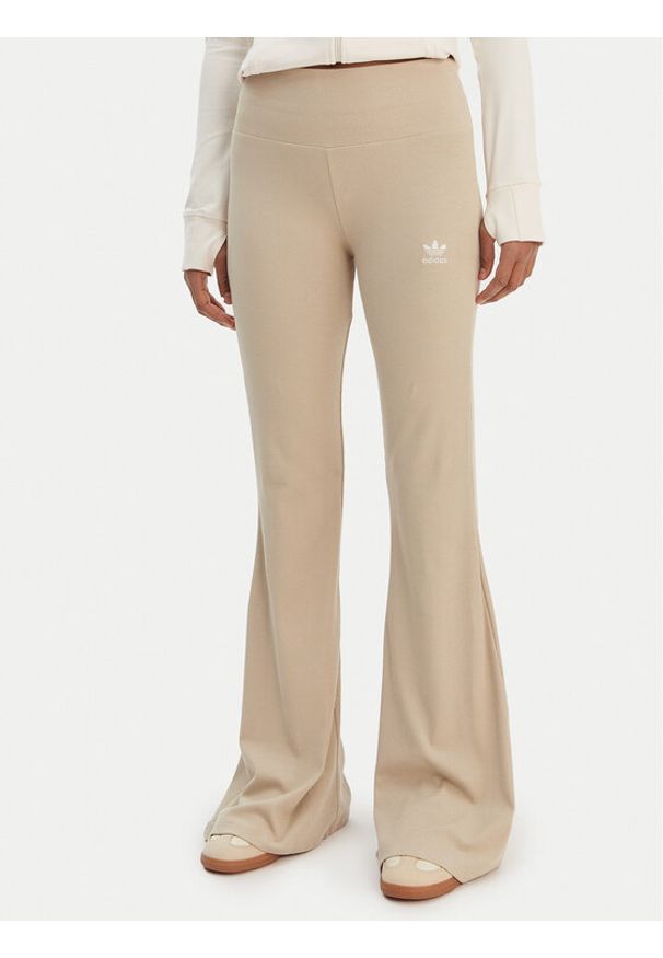 Adidas - adidas Legginsy Essentials KD3850 Beżowy Flared Leg. Kolor: beżowy. Materiał: bawełna