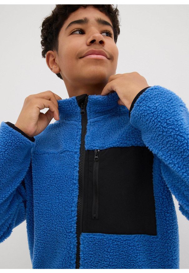 bonprix - Bluza rozpinana z polaru baranka. Kolor: niebieski. Materiał: polar