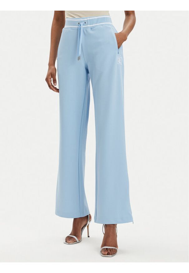 Juicy Couture Spodnie dresowe Kurt JCSBJ224418 Niebieski Regular Fit. Kolor: niebieski. Materiał: syntetyk