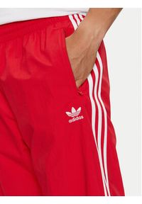 Adidas - adidas Spodnie dresowe Adicolor Woven Firebird IT2498 Czerwony Regular Fit. Kolor: czerwony. Materiał: syntetyk #4