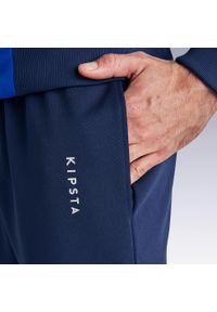 KIPSTA - Spodnie piłkarskie Kipsta Essential. Kolor: niebieski. Materiał: poliester, materiał. Sport: piłka nożna