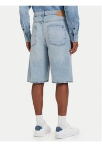 Tommy Jeans Szorty jeansowe Theo DM0DM23007 Niebieski jasny Loose Fit. Kolor: niebieski. Materiał: bawełna #2
