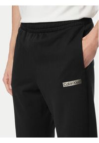 Calvin Klein Spodnie dresowe LV04LG212G Czarny Regular Fit. Kolor: czarny. Materiał: bawełna #5