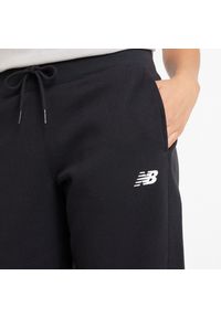 Spodnie damskie New Balance WP43805BK – czarne. Stan: podwyższony. Kolor: czarny. Materiał: poliester, bawełna, dresówka #5