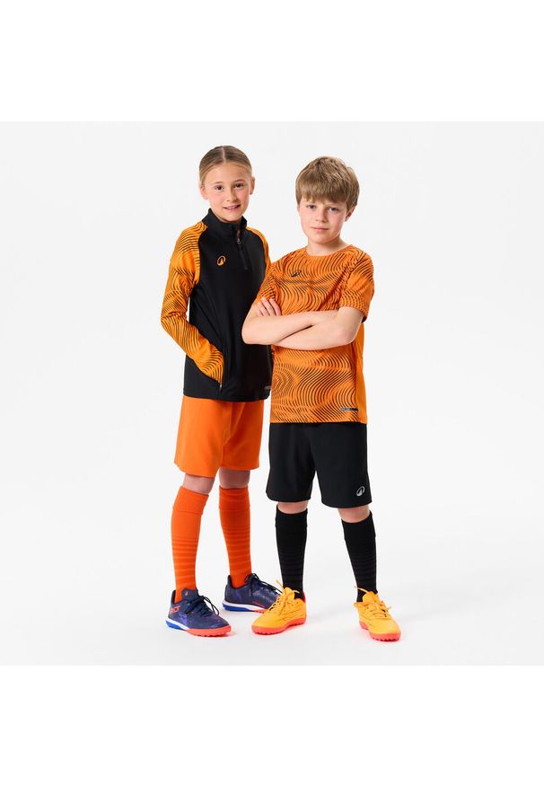 KIPSTA - Bluza piłkarska na krótki suwak dla dzieci Kipsta Viralto Wavy Club. Kolor: pomarańczowy, wielokolorowy, różowy. Materiał: poliester, materiał. Długość: krótkie. Sport: piłka nożna