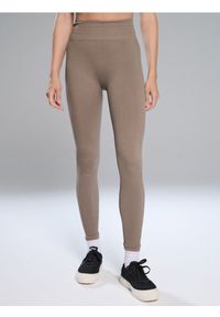 Sinsay - Legginsy sportowe - kremowy. Kolor: kremowy. Styl: sportowy