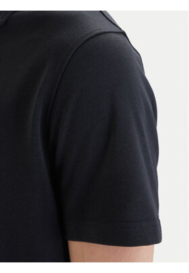 Under Armour Polo UA Icon 1386608 Czarny Loose Fit. Typ kołnierza: polo. Kolor: czarny. Materiał: syntetyk