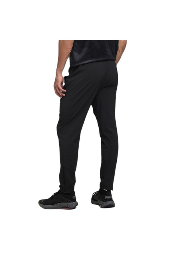 Spodnie dresowe Puma Teamwear Pwrtrain. Kolor: czarny. Materiał: dresówka. Sport: fitness, piłka nożna