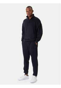 TOMMY HILFIGER - Tommy Hilfiger Spodnie dresowe Terry MW0MW37236 Granatowy Regular Fit. Kolor: niebieski. Materiał: bawełna #5
