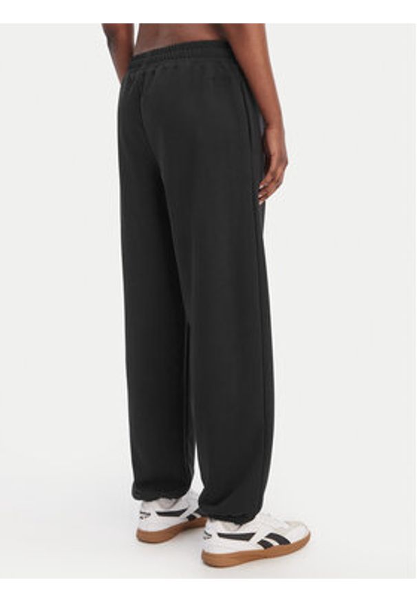 Reebok Spodnie dresowe Reebok x Ewa Chodakowska Ada RK25621CCW Czarny Relaxed Fit. Kolor: czarny. Materiał: syntetyk