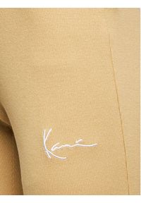 Karl Kani Spodnie dresowe Small Signature Flared Rib 6104086 Beżowy Flare Fit. Kolor: beżowy. Materiał: bawełna