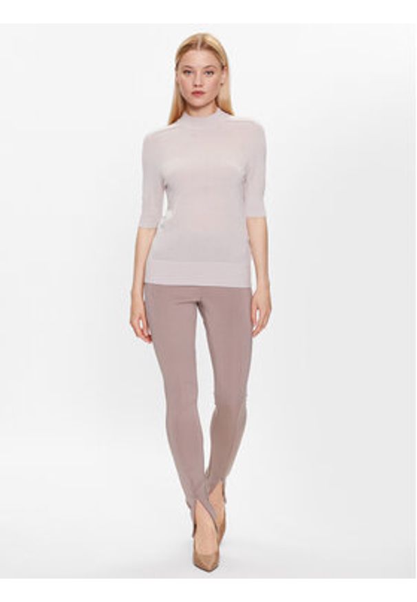Calvin Klein Legginsy K20K205357 Beżowy Slim Fit. Kolor: beżowy. Materiał: syntetyk