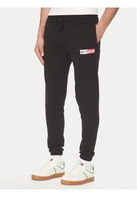 Tommy Jeans Spodnie dresowe Entry DM0DM20277 Czarny Slim Fit. Kolor: czarny. Materiał: bawełna