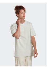 Adidas - adidas T-Shirt Reveal Essentials HK2723 Beżowy Loose Fit. Kolor: beżowy. Materiał: bawełna