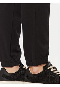 Guess Spodnie dresowe O5RB01 KCO31 Czarny Regular Fit. Kolor: czarny. Materiał: bawełna #5