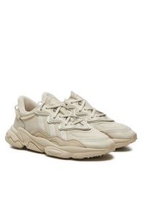 Adidas - adidas Sneakersy Ozweego FX6029 Beżowy. Kolor: beżowy. Materiał: materiał