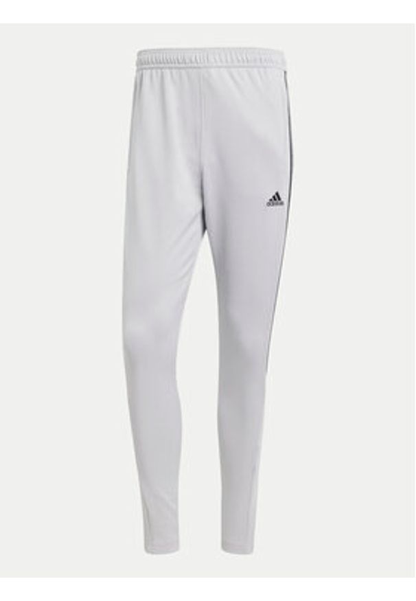 Adidas - adidas Spodnie dresowe Tiro IY4288 Szary Regular Fit. Kolor: szary. Materiał: bawełna, syntetyk