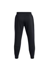 Spodnie Joggery Under Armour Unstoppable Flc Damskie. Kolor: czarny. Materiał: poliester, materiał, bawełna, syntetyk, elastan. Sport: bieganie